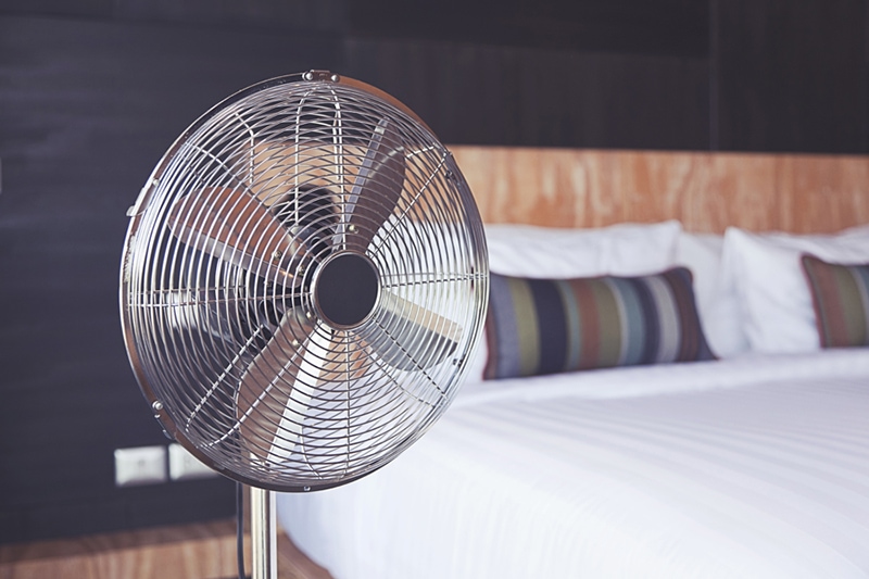 fan in a bedroom.